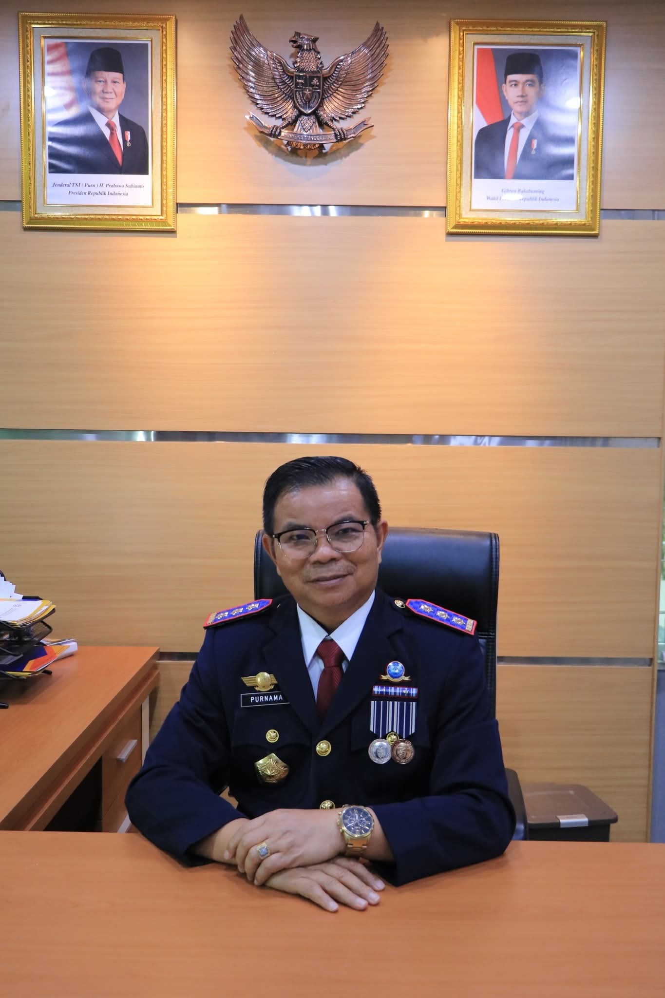 Foto Purnama Pangalinan S.T., MM.Tr.